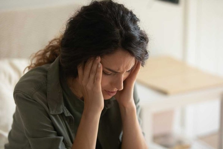 Worried young Caucasian woman feel stressed upset thinking of life problems solution at home. Anxious unhappy millennial female distressed with bad negative news, have relations personal troubles.