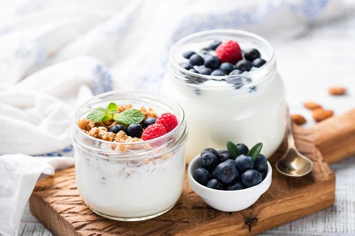 Natural Greek Yogurt With Fresh Berries And Granola In Jar. Healthy Eating, Healthy Lifestyle, Sporty Fitness Food Menu Concept