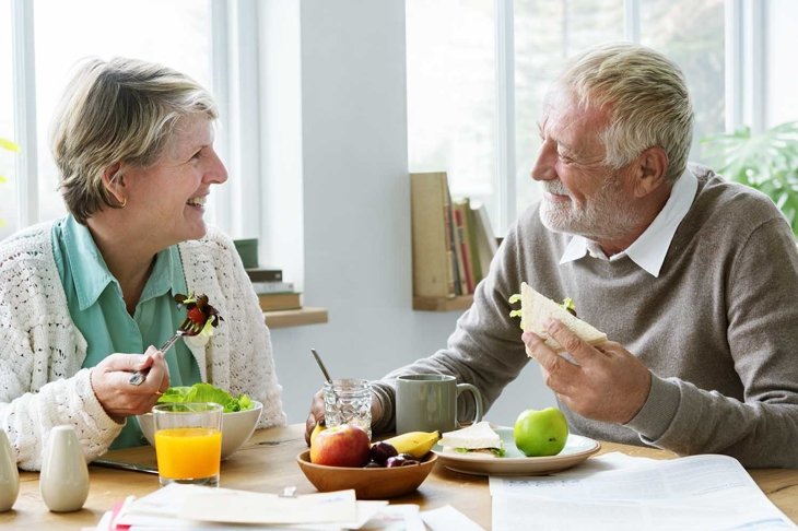 Pensioner Elderly Couple Eating Brunch Concept